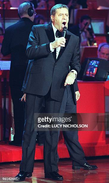 Comedian Jerry Lewis sings at the start of the 34th annual Jerry Lewis Telethon, which benefits the Muscular Dystrophy Association in Hollywood, CA...