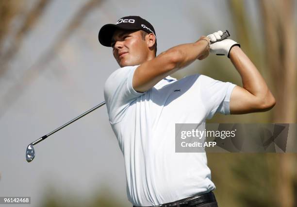 Martin Kaymer of Germany competes on the last day of the Abu Dhabi Golf Championship on January 24, 2010 in the Emirati capital. Kaymer won the 1.5...