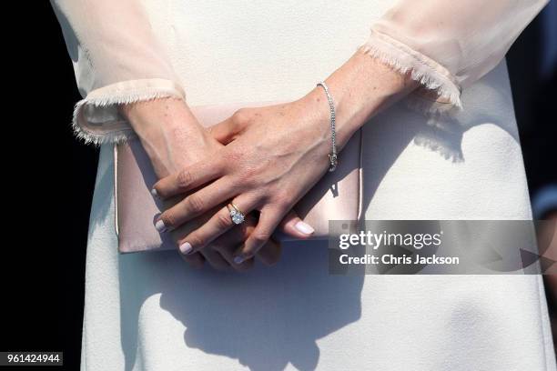 Meghan, Duchess of Sussex, ring and purse detail, attends The Prince of Wales' 70th Birthday Patronage Celebration held at Buckingham Palace on May...