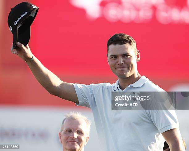 Martin Kaymer of Germany waves to the crowd after winning the 1.5 million euro Abu Dhabi Golf Championship for the second time in three years on...