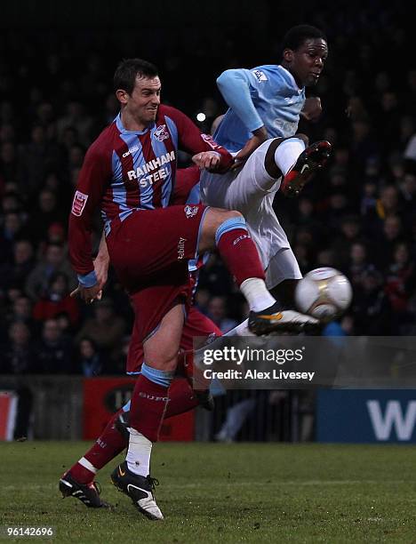 Paul Hayes of Scunthorpe United scores his team's first goal during the FA Cup sponsored by E.ON Fourth round match between Scunthorpe United and...