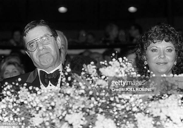 Comedian Jerry Lewis and his wife Sandee Pitnick smile 12 March 1984 at the Opera in Paris, at the occasion of the Pasteur Weizmann Gala evening. AFP...