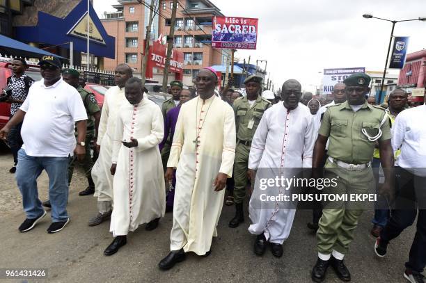 Catholic Archbishop of Lagos Alfred Adewale Martins leads a march to protest against victims of violent attacks across the country in Lagos, on May...