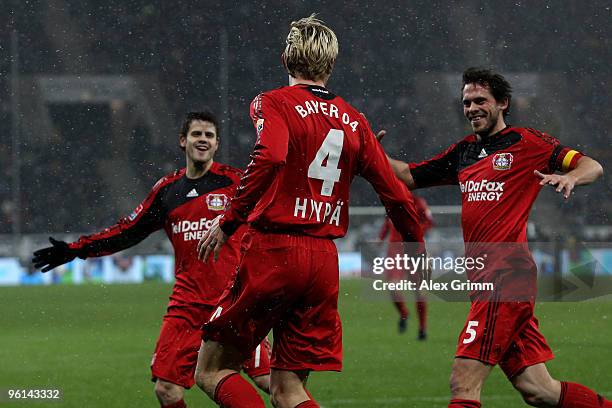 Sami Hyypiae of Leverkusen celebrates his team's first goal with team mates Manuel Friedrich and Tranquillo Barnetta during the Bundesliga match...
