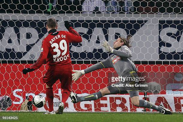 Toni Kroos of Leverkusen scores his team's second goal against goalkeeper Timo Hildebrand of Hoffenheim during the Bundesliga match between 1899...