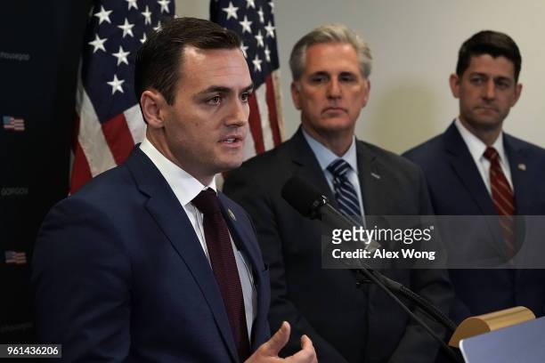 Rep. Mike Gallagher speaks as House Majority Leader Rep. Kevin McCarthy , and Speaker of the House Rep. Paul Ryan listen during a news briefing after...