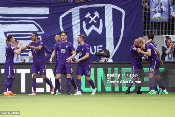 Soeren Bertram of Aue celebrates his team's first goal with team mates during the 2. Bundesliga Playoff Leg 2 match between Erzgebirge Aue and...