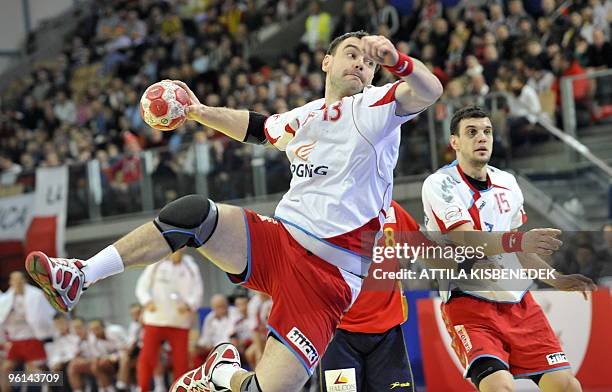 Polish Bartosz Jurecki scores a goal against Spain in the Olympic Hall of Innsbruck on January 24, 2010 during the Euro 2010 Handball, Main Round...