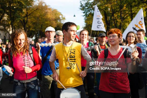 Samba band plays during a march in support of refugees fleeing Syria's civil war and other conflict zonesarriving in Austria in massive numbers amid...