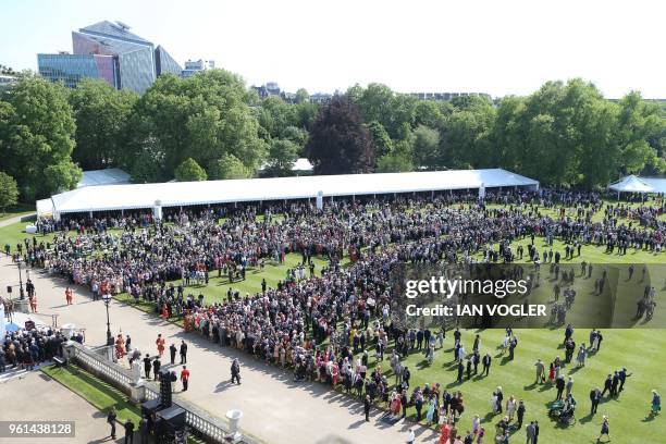 Guests attend the Prince of Wales's 70th Birthday Garden Party at Buckingham Palace in London on May 22, 2018. - The Prince of Wales and The Duchess...