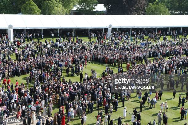 Guests attend the Prince of Wales's 70th Birthday Garden Party at Buckingham Palace in London on May 22, 2018. - The Prince of Wales and The Duchess...