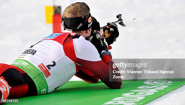 Dominik Landertinger of Austria takes 3rd place during the e.on Ruhrgas IBU Biathlon World Cup Men's 12.5 km Pursuit on January 24, 2010 in...