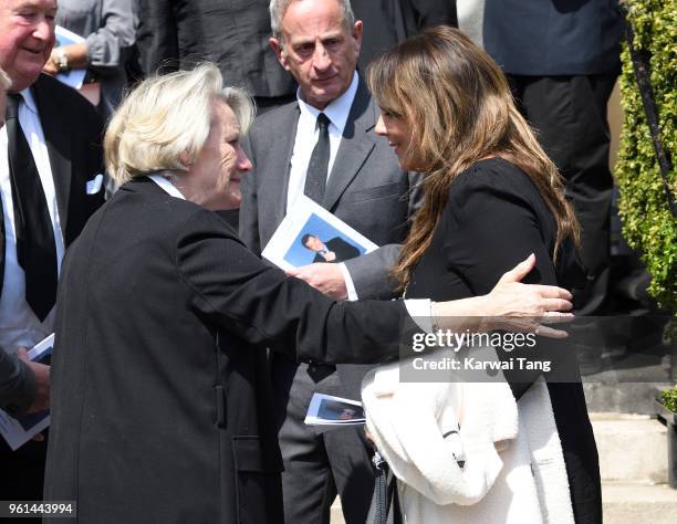 Martine McCutcheon is consoled by a mourner during the funeral of Dale Winton at the Old Church, 1 Marylebone Road on May 22, 2018 in London, England.