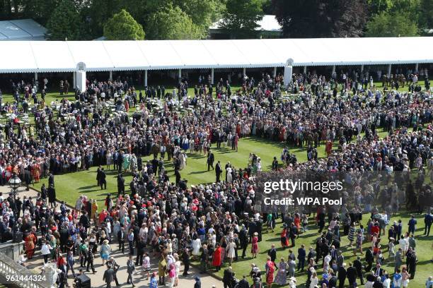 Prince Charles, Prince of Wales, Camilla, Duchess of Cornwall,Prince Harry, Duke of Sussex and Meghan, Duchess of Sussex greet guests during The...