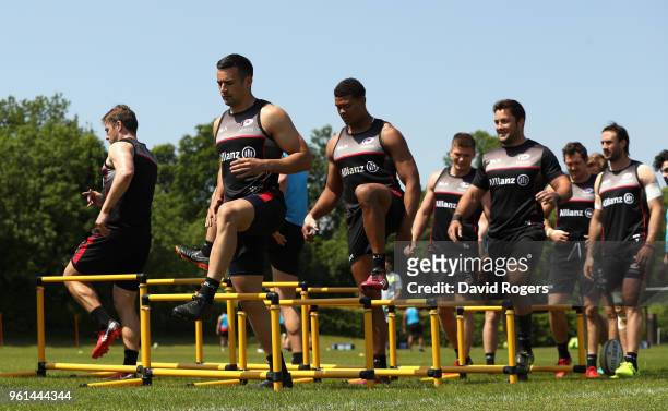 Saracens warm up during the Saracens training session held at Old Albanians on May 22, 2018 in St Albans, England.