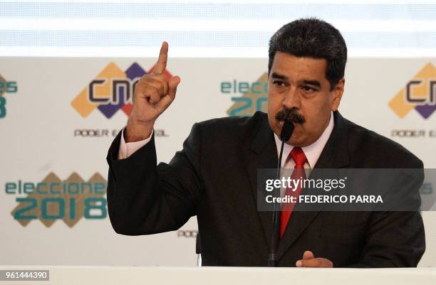 Venezuelan President Nicolas Maduro speaks at the National Electoral Council headquarters in Caracas, during the ceremony in which he was proclaimed...