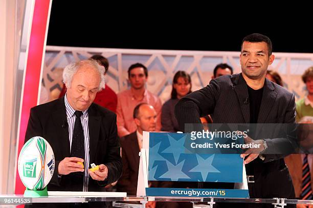 Jean-Pierre Lux president of the ERC and former France rugby player Emile N'Tamack participate at the Heineken cup draw, at France Television on...
