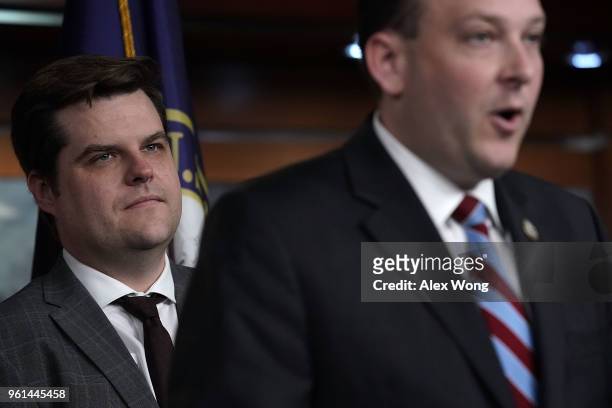 Rep. Lee Zeldin speaks as Rep. Matt Gaetz listens during a news conference May 22, 2018 on Capitol Hill in Washington, DC. Rep. Zeldin will introduce...