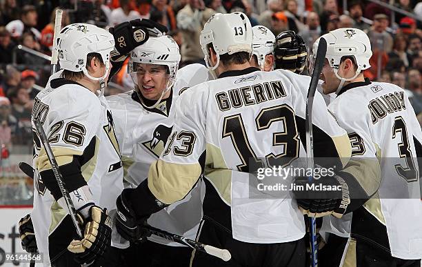 Ruslan Fedotenko, Sidney Crosby, Bill Guerin, and Alex Goligoski the Pittsburgh Penguins celebrate theirteams first goal of the game against the...