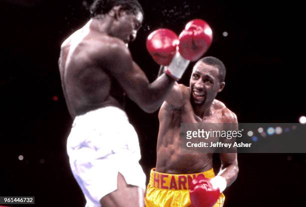 Boxer Thomas Hearns connects with Boxer Michael Olajide Convention Hall in Atlantic City, New Jersey April 28 1990.