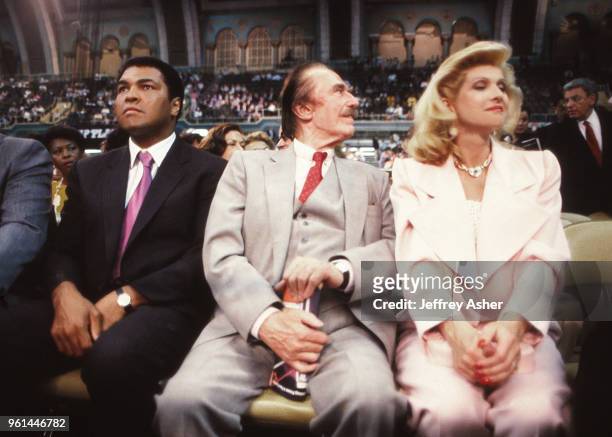 Boxer Muhammad Ali, Businessman Fred Trump and First Wife of Donald Trump, Ivana Trump ringside at Tyson vs Holmes Convention Hall in Atlantic City,...