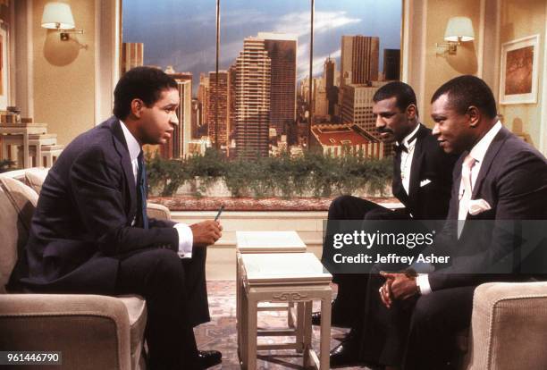 Journalist Bryant Gumbel Boxer Michael Spinks and Promoter and Manager Butch Lewis on the set of The Today Show June 1988.