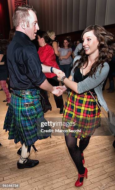 Couple dances at the Ceilidh Club ahead of Burns night, on January 23, 2010 in London, England. Scots across the world annually celebrate the life of...