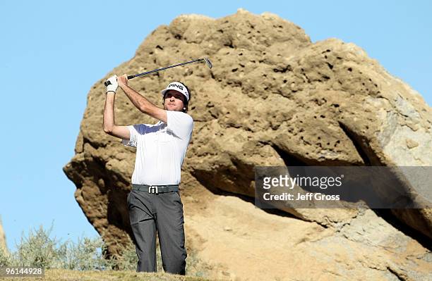 Bubba Watson hits a tee shot on the third hole during the fourth round of the Bob Hope Classic at the Nicklaus Private course at PGA West on January...