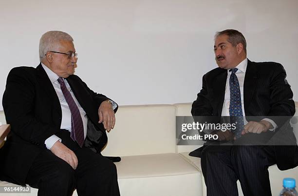 In this handout image provided by the Palestinian President's Office , Palestinian President Mahmoud Abbas meets with Jordanian Foreign Minister...