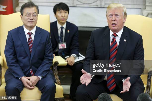 President Donald Trump, right, speaks as Moon Jae-in, South Korea's president, listens during a meeting in the Oval Office of the White House in...