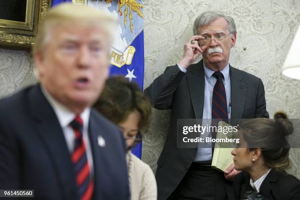 John Bolton, national security advisor, listens as U.S. President Donald Trump, left, speaks during a meeting with Moon Jae-in, South Korea's...
