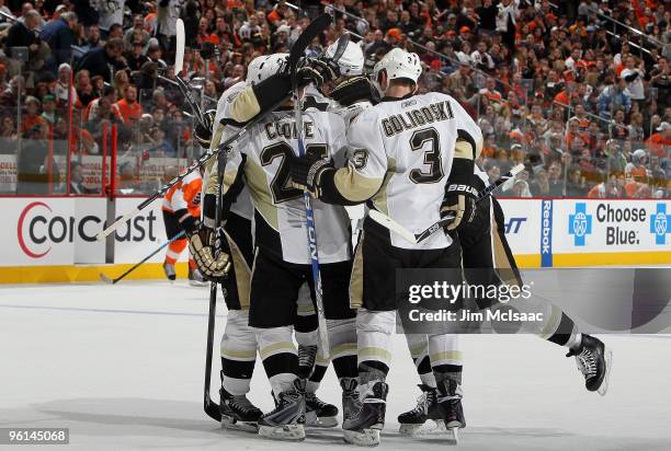 Matt Cooke of the Pittsburgh Penguins celebrates his third period goal against the Philadelphia Flyers with his teammates on January 24, 2010 at...