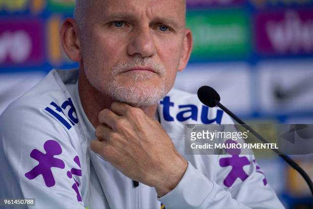 Brazil's national football goalkeeper coach and former World Cup 1994 champion Claudio Taffarel speaks during a press conference on the second...