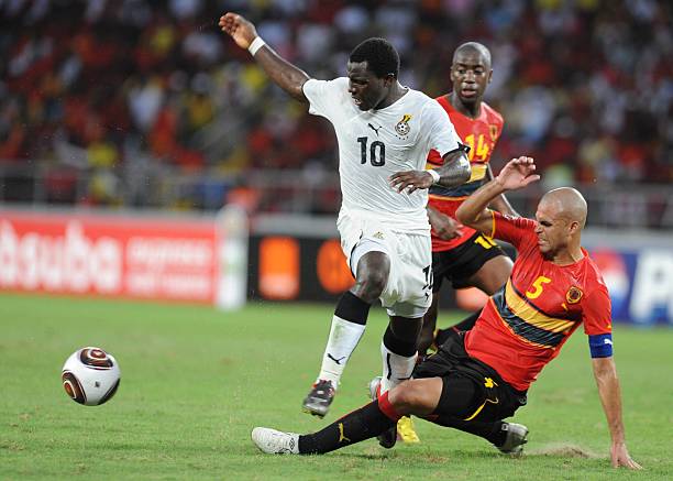 Kwadwo Asamoah of Ghana and Kali of Angola in action during the Africa Cup of Nations Quarter Final match between Angola and Ghana from the November...