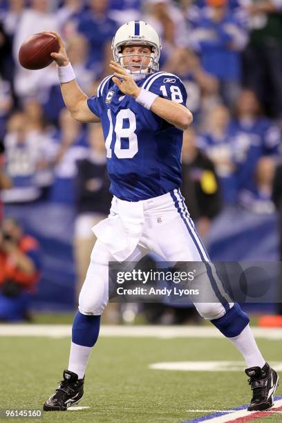 Quarterback Peyton Manning of the Indianapolis Colts passes the ball in the first half against the New York Jets during the AFC Championship Game at...