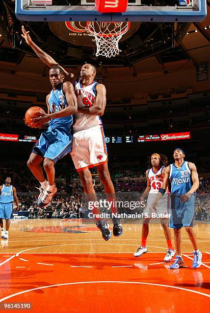 Rodrigue Beaubois of the Dallas Mavericks goes up against Jonathan Bender of the New York Knicks on January 24, 2010 at Madison Square Garden in New...