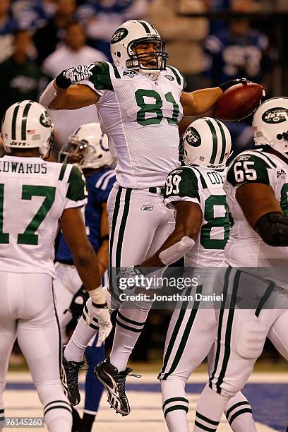 Dustin Keller of the New York Jets celebrates his touchdown in the second quarter with teammates Jerricho Cotchery and Braylon Edwards while playing...