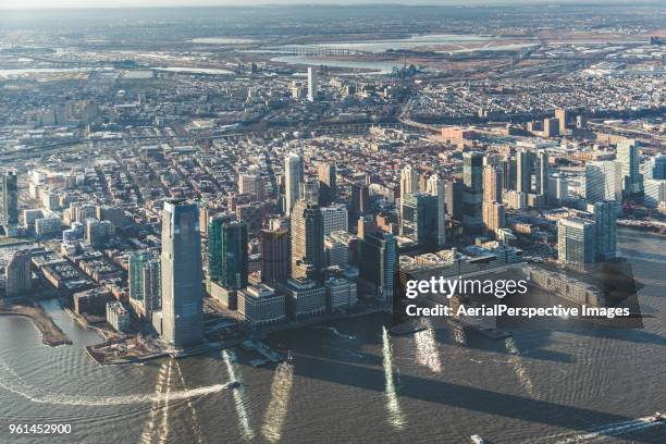 drone point view of jersey city and the hudson river - jersey city stockfoto's en -beelden