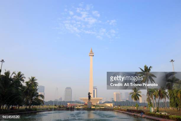 ponds in national monument monas, jakarta. - jakarta stock pictures, royalty-free photos & images