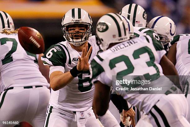 Mark Sanchez of the New York Jets passes to teammate Shonn Greene while playing against the Indianapolis Colts during the second quarter of the AFC...