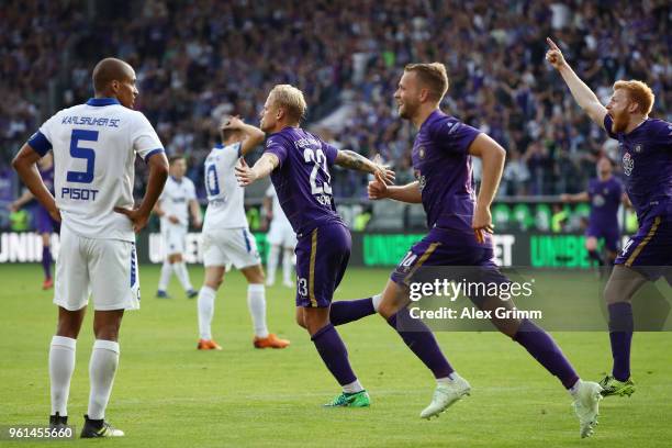 Soeren Bertram of Aue celebrates his team's third goal with team mates during the 2. Bundesliga Playoff Leg 2 match between Erzgebirge Aue and...