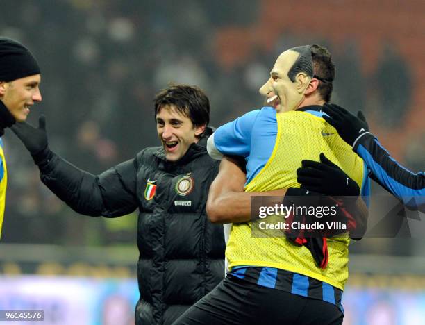 Marco Materazzi and Diego Milito of FC Internazionale Milano celebrate after winning the Serie A match between Inter Milan and AC Milan at Stadio...