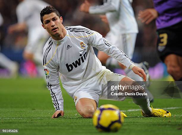 Cristiano Ronaldo of Real Madrid falls during the La Liga match between Real Madrid and Malaga at the Santiago Bernabeu stadium on January 24, 2010...