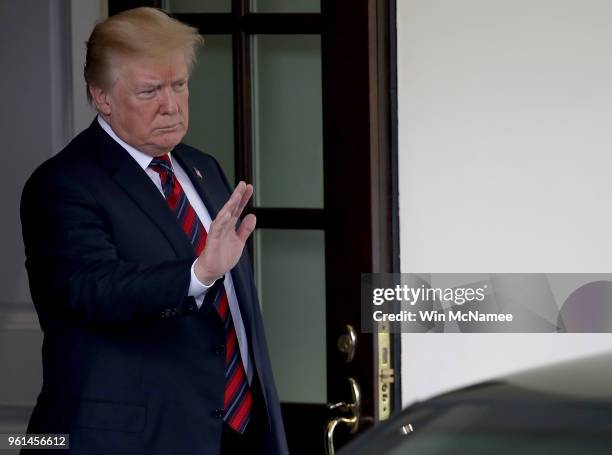 President Donald Trump waves to Republic of Korea President Moon Jae-in as Moon departs the White House May 22, 2018 in Washington, DC. Trump and...