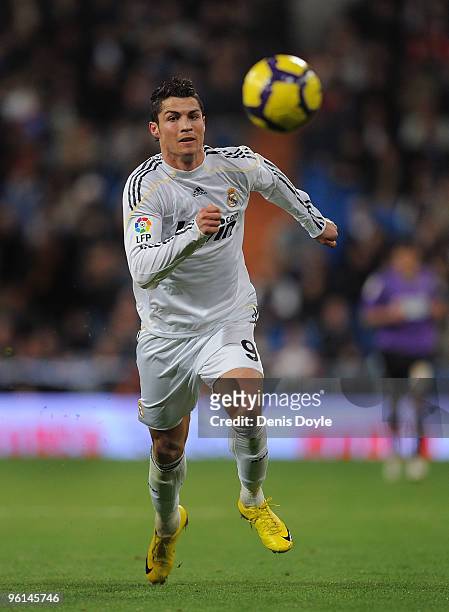 Cristiano Ronaldo of Real Madrid chases a long ball during the La Liga match between Real Madrid and Malaga at the Santiago Bernabeu stadium on...