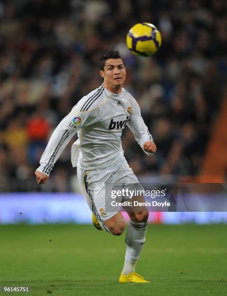 Cristiano Ronaldo of Real Madrid chases a long ball during the La Liga match between Real Madrid and Malaga at the Santiago Bernabeu stadium on...