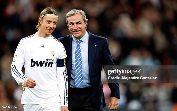 Spanish rally driver Carlos Sainz and Real Madrid player Guti talk before the la Liga match between Real Madrid and Malaga at Estadio Santiago...