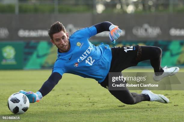 Australian goalkeeper Brad Jones makes a save during the Australian Socceroos training session at the Gloria Football Club on May 22, 2018 in...