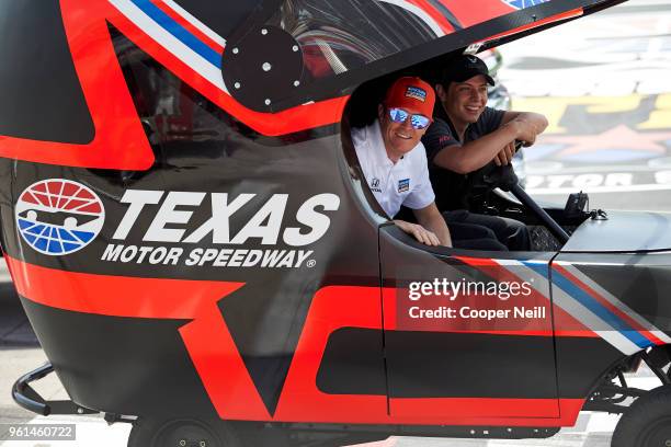 Drivers Scott Dixon and Gabby Chavez arrive for the first day of Speeding To Read at Texas Motor Speedway on May 22, 2018 in Fort Worth, Texas.