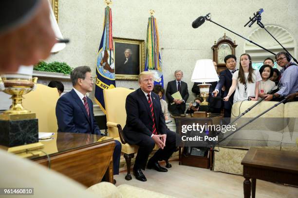 President Donald Trump speaks with South Korean President Moon Jae-in during a meeting in the Oval Office of the White House on May 22, 2018 in...